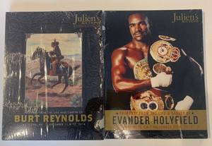 lot 455 image: Sealed Collectible Catalogs Burt Reynolds & Evander Holyfield Auctions