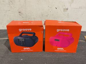 lot 127 image: LOT OF 2 Onn. Portable CD Boombox with Digital FM Radio