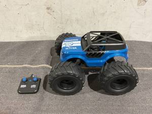 lot 149 image: Sharper Image Rampage Renegade Remote Control Off-Road Truck for Children
