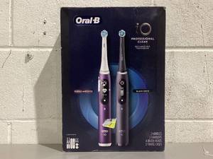 lot 563 image: Oral-B iO Series 7s Electric Toothbrush, 4 Heads