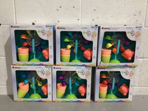 lot 545 image: LOT OF 6 Sassy Mover & Shaker Sensory Baby Toy Gift Set - 6 Months