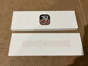 lot 26 image: Apple Watch Series 10 GPS 46mm Rose Gold Aluminum Case MWWT3LWA