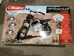 lot 673 image: Razor Dirt Rocket MX350 - Black with Decals, up to 14 mph, 24V Electric Dirt Bike for Child 8