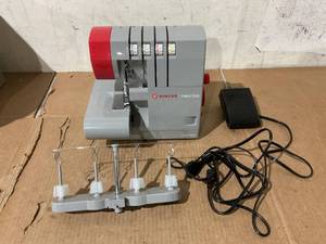 lot 58 image: SINGER HD0450S Heavy Duty Serger, Sew and Cut Heavy Duty Fabrics with Ease, 234 Thread, 60% Larger Cutting Knife, Easy Rolled Hem
