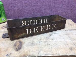 lot 299 image: Vintage John Deere - Metal Tractor Part