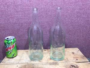 lot 159 image: 2 Vintage Embossed Bottles - Red Wing - Chippewa Falls