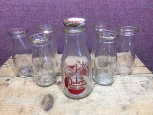 lot 269 image: Vintage Duluth - DMDA Bottles