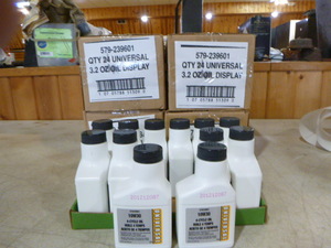 lot 36 image: 4 Cases of Universal 10W30 4-Cycle Oil