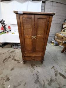 lot 37 image: Vintage Wooden Armoire with Woven Panels and Shelving