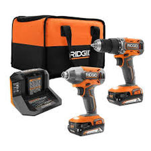 lot 21 image: RIDGID 18V Cordless 2-Tool Combo Kit with DrillDriver, Impact Driver, (2) 2.0 Ah Batteries, and Charger  Customer Returns See Pictures