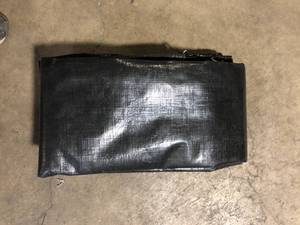 lot 3 image: Black Tarp Customer Returns See Pictures