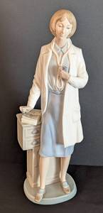 lot 29 image: Lladro NAO Female Doctor Porcelain Figurine