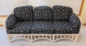 lot 34 image: Pretty Butterfly Print Rattan Sofa