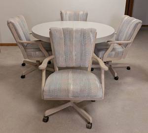 lot 14 image: Vintage Round Wood Laminate Table and Rolling Chairs