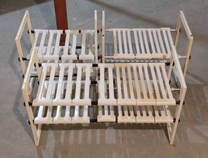 lot 242 image: Three Expanding Storage Shelves