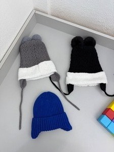 Lot of miscellaneous baby/toddler toys. Foam blocks, magnetic blocks, winter hats, box of stacking toys...