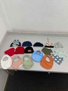 lot 32 image: Lot of baby hats and bibs