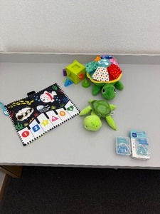 lot 48 image: Lot of baby toys and pacifiers