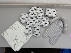 lot 53 image: Car seat covers and bamboo waterproof crib mattress protector