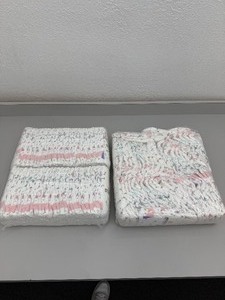 lot 56 image: Lot of Kirkland brand diapers- size 4