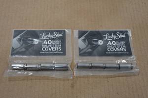 lot 33 image: 2 Sets of 4 Lucky Shot .40 Cal Nickel Valve Stem Covers