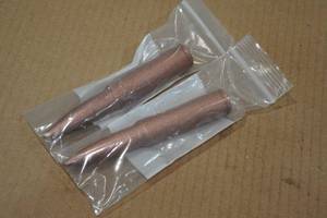 lot 123 image: 2 Copper Novelty 50 BMG Rounds