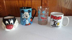 lot 235 image: Cartoon Themed Mugs And Glasses.