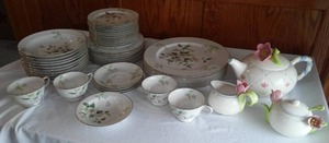lot 306 image: Avon And Sango Apple Blossum Dishware.