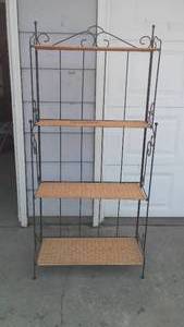lot 584 image: Black Metal Shelving Unit With Wicker Style Foldable Shelves.