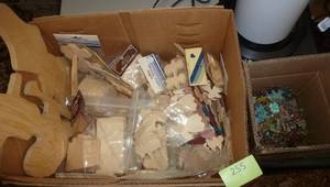 lot 255 image: Box full of wood crafting cutouts, puzzle pins, Metal garden fairy shadows, doll ornaments