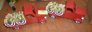 lot 262 image: TWO Metal trucks with watermelons