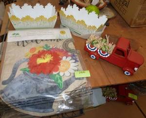 lot 266 image: TWO planters, pickup and solar garden flag