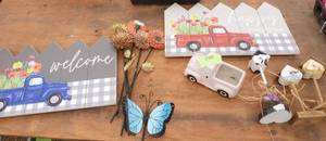 lot 290 image: Wall hangings and plant stakes and mini birdhouse figures