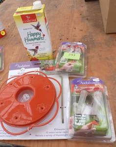 lot 293 image: Hummingbird feeders and nectar