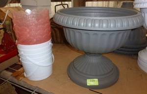 lot 310 image: New Grey plastic 18 inch urn planter and 10 bucket planters