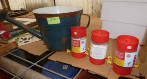 lot 314 image: Metal watering can planter and 3 hummingbird feeders