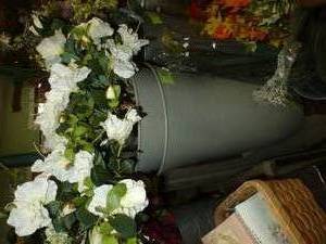 lot 6 image: Two new plastic planters full of white silk flowers and other