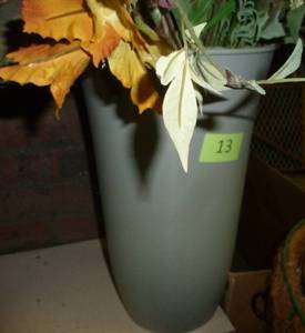 lot 13 image: Plastic planter very Full of various fall color silks and berries