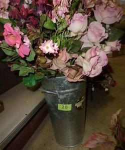 lot 20 image: Metal planter with pink flowers
