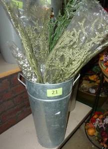 lot 21 image: Metal planter with greenery