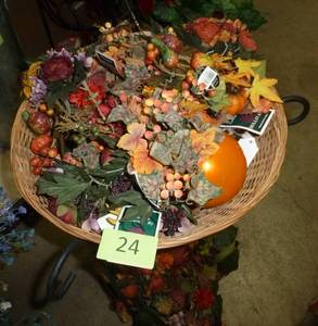lot 24 image: Black metal plant stand with pretty fall colors