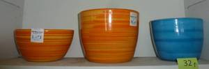 lot 32 image: THREE colorful terracotta glazed planter pots