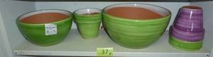lot 37 image: FIVE colorful terracotta glazed planter pots