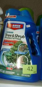 lot 42 image: TWO jugs of Tree & Shrub Protect and Feed