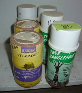 lot 86 image: FOUR cans of tree tanglefoot insect barrier for your trees and TWO Stump Out