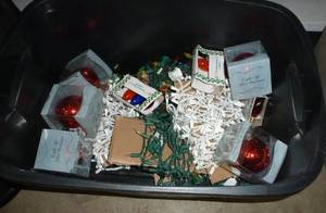 lot 124 image: Tote full of christmas lights and red light up bulbs from holidazzle
