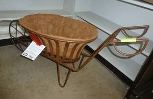 lot 129 image: Cute metal wheelbarrow planter