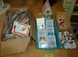 lot 135 image: Box full of mini christmas musical instruments, Angel Wings, Snowmen, candle holder