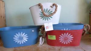 lot 145 image: FOUR metal planters