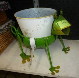 lot 146 image: Metal frog with planter